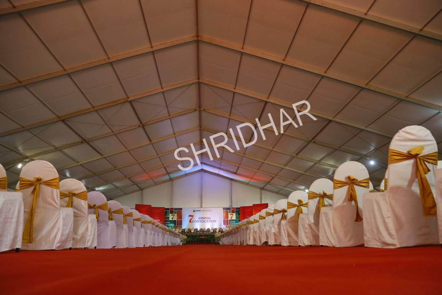 synthetic red carpets and stylish chairs with cloth covers for rent in bangalore for conventions shridhar tent house